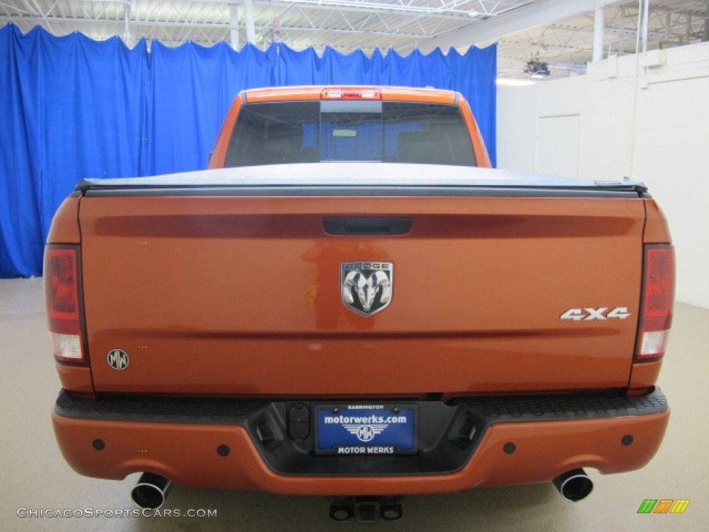 2009 Ram 1500 Sport Quad Cab 4x4 - Sunburst Orange Pearl / Dark Slate/Medium Graystone photo #7