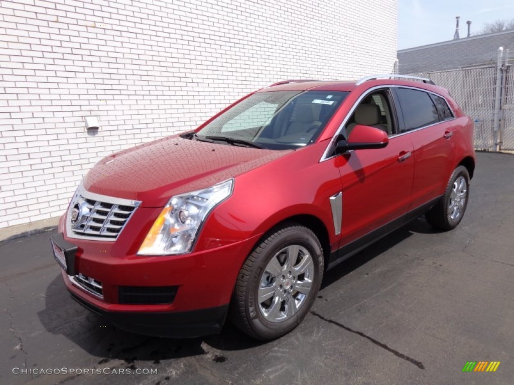 Crystal Red Tintcoat / Shale/Brownstone Cadillac SRX Luxury